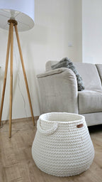 Round XXL basket in Ivory used for laundry and toy storage in a family home