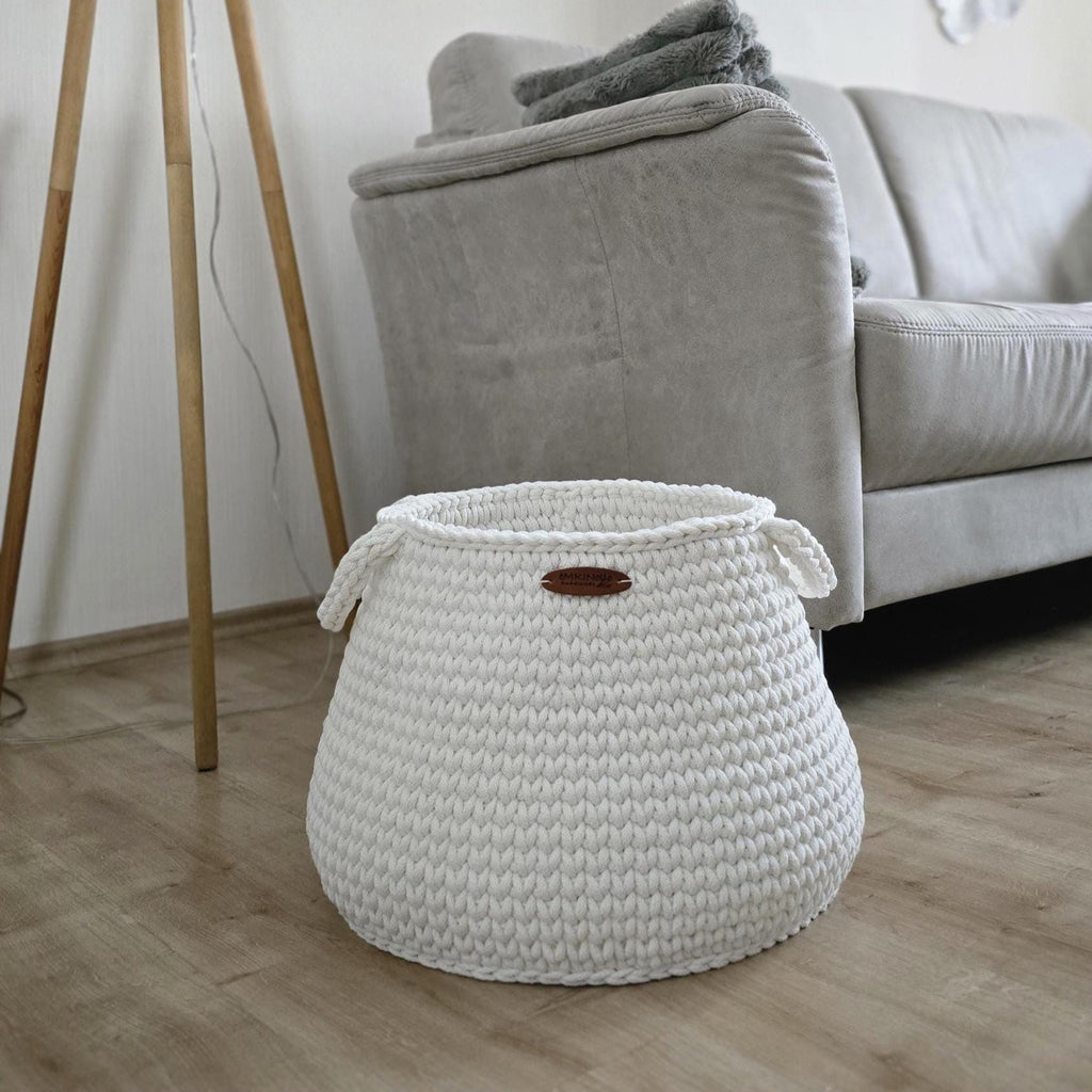 Toy storage basket placed in a children’s room with a warm interior feel