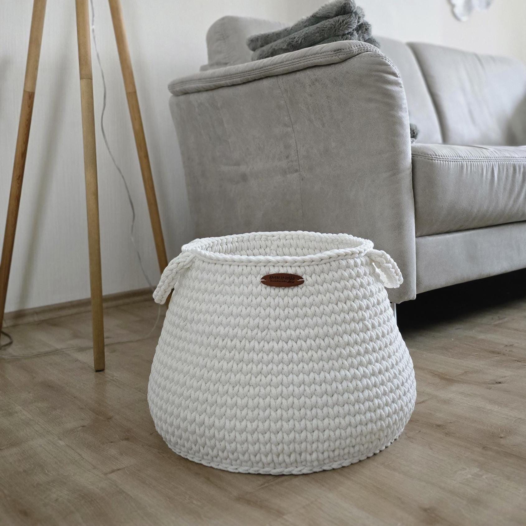 Toy storage basket placed in a children’s room with a warm interior feel